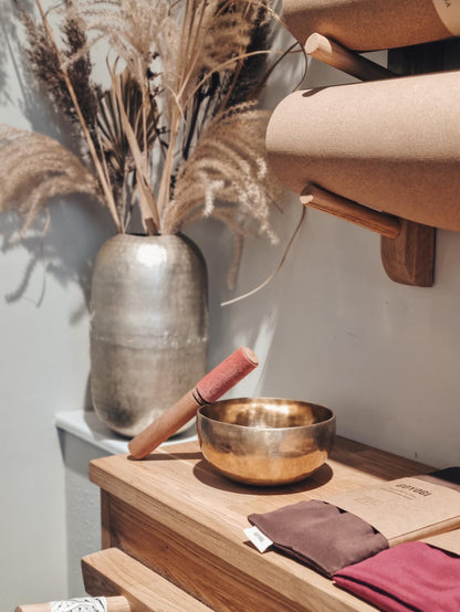 Singing bowl with wooden stick -