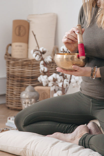 Singing bowl with wooden stick -